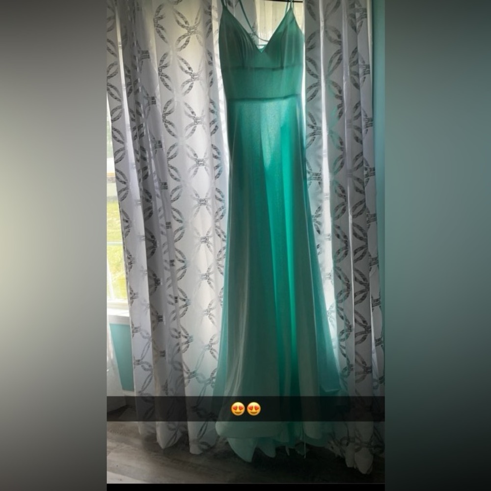 Ordered wrong size Jovani prom dress. Teal color